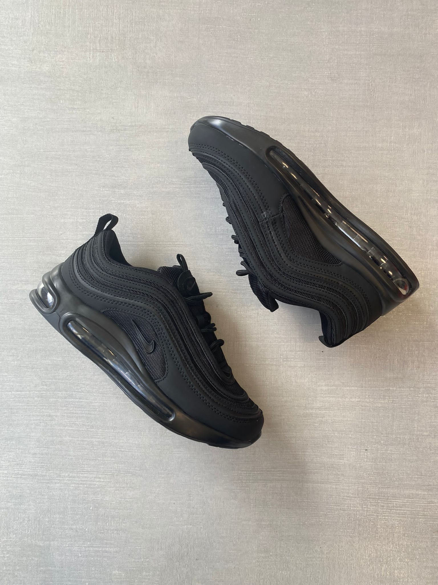 AM 97 Negras